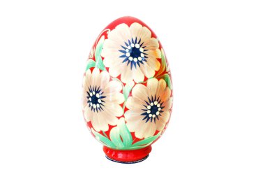 Beyaz arka planda tahta yumurtalar. Petrikovskaya resmi.