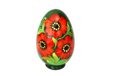 Beyaz arka planda tahta yumurtalar. Petrikovskaya resmi.