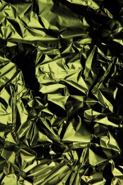 Folyo arka plan. Buruşuk folyo. Soyut arkaplan. Duvar kağıdı. Yeşil