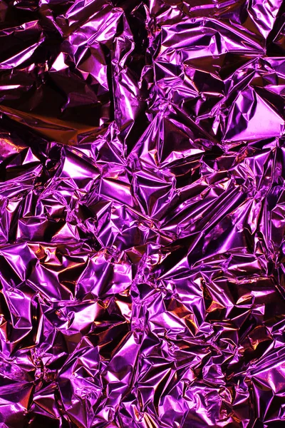 Folyo arka plan. Buruşuk folyo. Soyut arkaplan. Duvar kağıdı. Pembe.