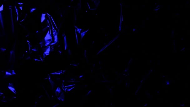 Gloeien Folieachtergrond Gekrompen Folie Abstracte Achtergrond Blauw Rood Paars — Stockvideo