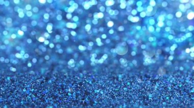 Mavi bokeh. Parlak bir arka plan. Güzel parlayan bokeh. Parlak bir arka plan. Parlak ışık efekti