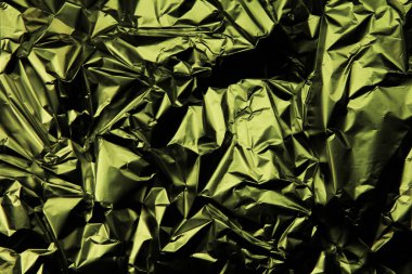 Folyo arka plan. Buruşuk folyo. Soyut arkaplan. Duvar kağıdı. Yeşil