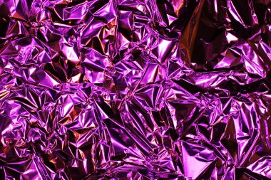 Folyo arka plan. Buruşuk folyo. Soyut arkaplan. Duvar kağıdı. Pembe.