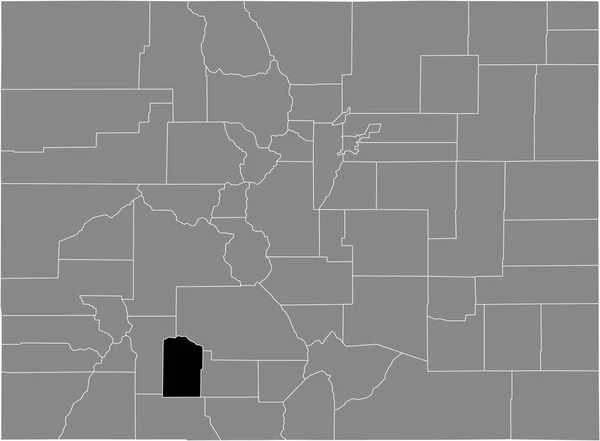 コロラド州 米国連邦州の灰色の地図の中の米国鉱物郡の黒いハイライトされた場所の地図 — ストックベクタ