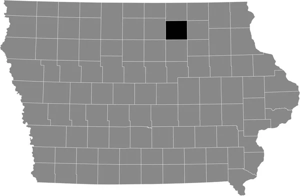 アメリカのアイオワ州の灰色の地図の中のフロイド郡の黒いハイライトされた場所 — ストックベクタ