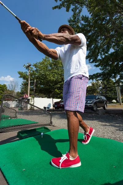 Golfsving på området — Stockfoto