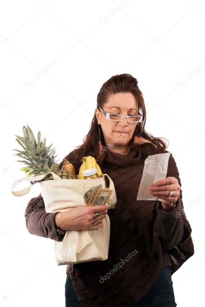 Grocery Shopper Reviewing Receipt