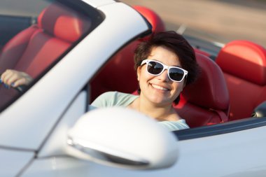 Woman Driving a Convertible clipart