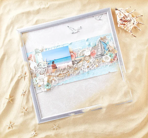 The handmade card, made with the technology of scrapbooking with cut and carved colourful elements