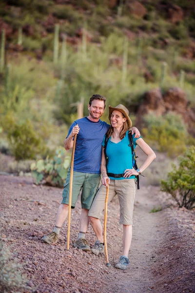 Affectionate couple hiking nature trail — Stock Photo, Image