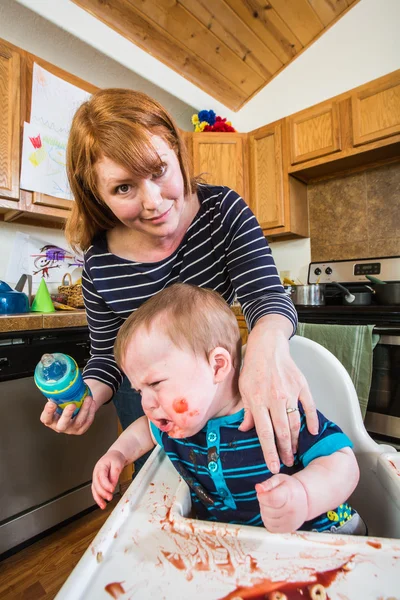 Woman Feeds Gumpy Baby — Stock Photo, Image