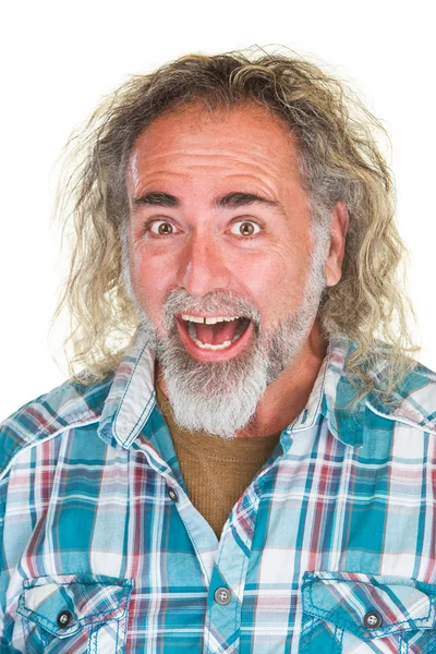 Смеющийся мужчина с длинными волосами — стоковое фото