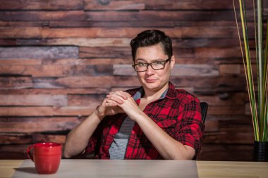 Smirking Butch Boss in Flannel
