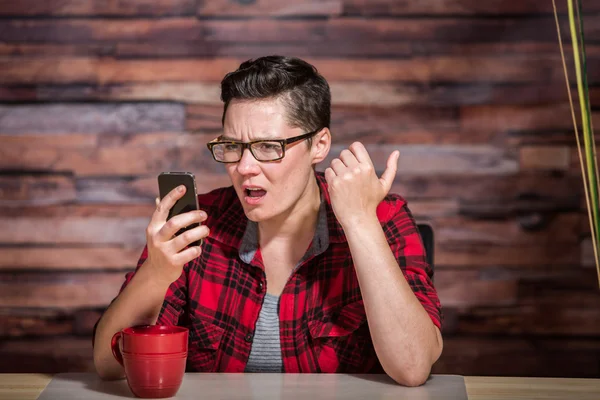 Shocked Butch Woman with Phone — Stock Photo, Image