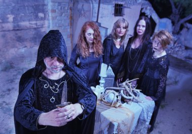 Wicca Priest and Coven in Ritual clipart