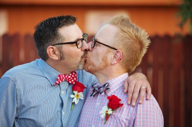 Married Men Kissing clipart