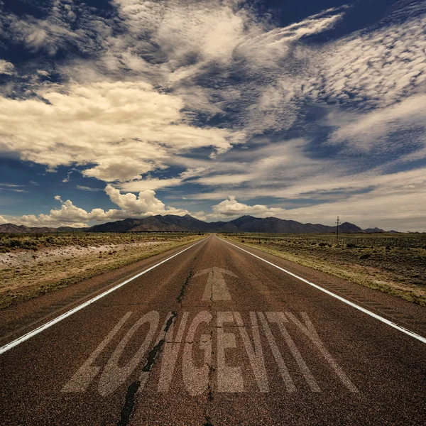Road With the Word Longevity — Stock Photo, Image