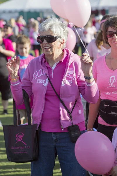 Mature Woman at Breast Cancer Awareness Event — Stock Photo, Image