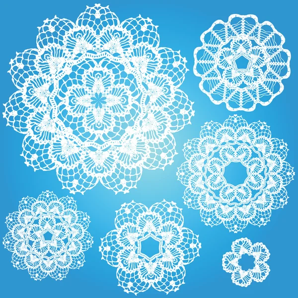 Set of snowflakes doilies. — Stock Vector