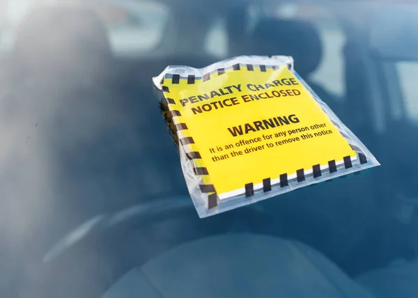 Parking ticket fine issued for parking violation while parking car in restricted no-parking zone