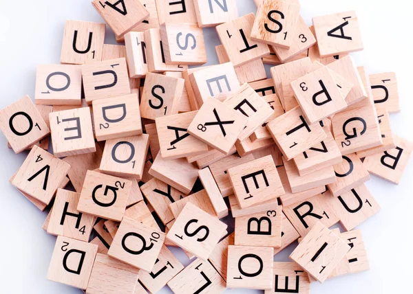 wooden alphabet blocks on white background