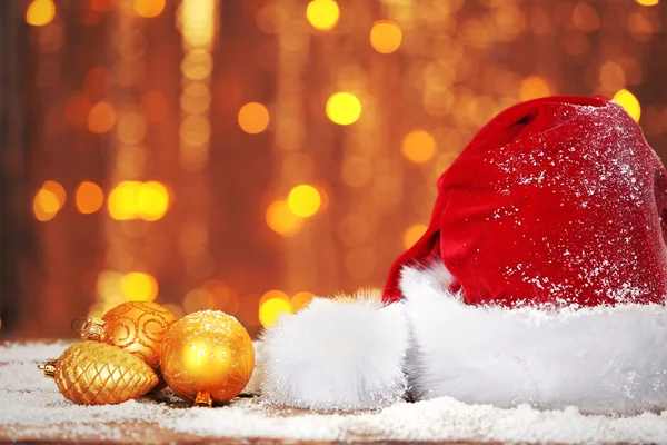 Santa Claus red hat with Christmas decorations — Stock Photo, Image