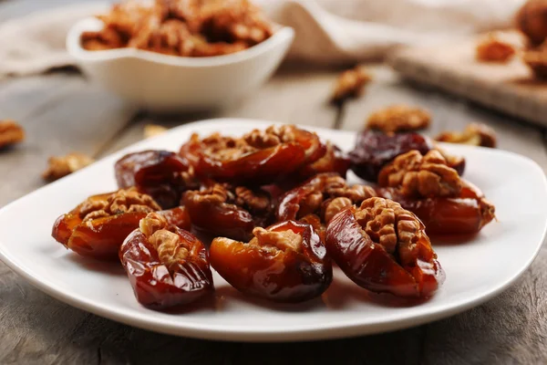 Walnut and date fruit — Stock Photo, Image