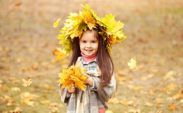 Happy young girl in yellow  wreath — Stock Photo, Image