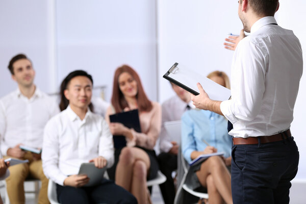 Young businessman making notes