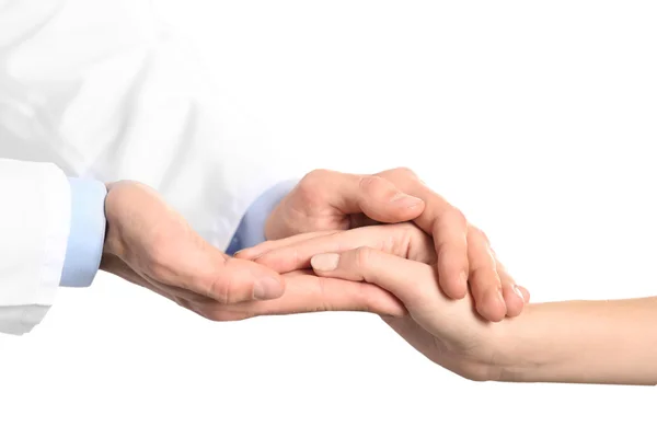 Läkaren håller patientens hand — Stockfoto