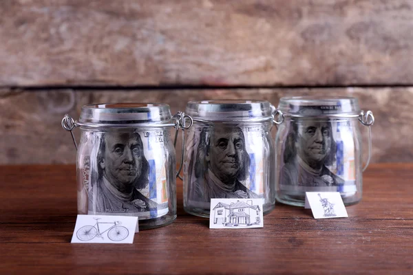 Rouleaux de billets en dollars pour différents besoins — Photo