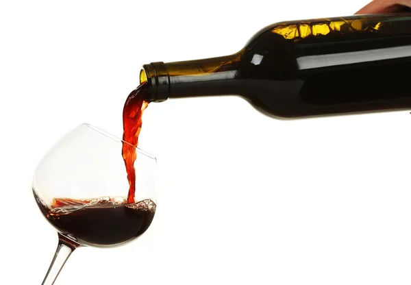 Red wine pouring in glass, isolated on white — Stock Photo, Image