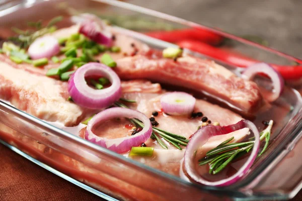 Marinating meat with spices — Stock Photo, Image