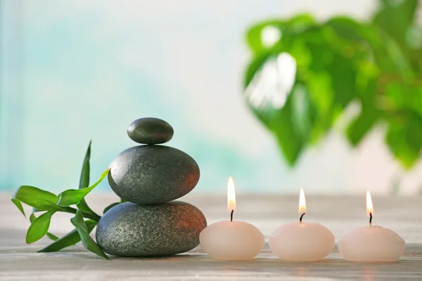 Spa stones with candles — Stock Photo, Image