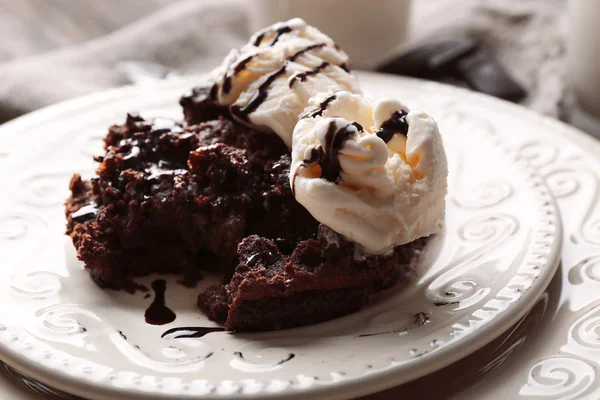 Chocolate lava cake with ice-cream on the plate, close-up — Stock Photo, Image