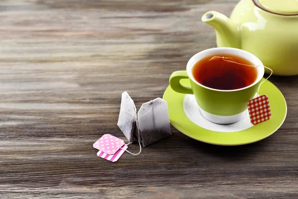 Cup of tea with tea bags — Stock Photo, Image