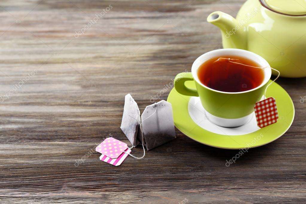 Cup of tea with tea bags Stock Photo by ©belchonock 100474808