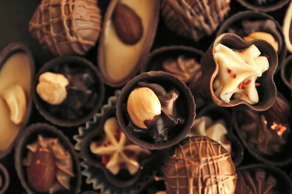 美味的巧克力糖果的背景下，靠得很近 — 图库照片