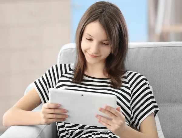 Beautiful girl with digital tablet — Stock Photo, Image