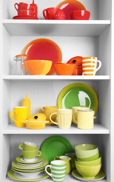 Tableware on shelves in the kitchen — Stock Photo, Image