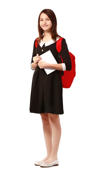 Schönes Schulmädchen mit Schultasche und Buch — Stockfoto