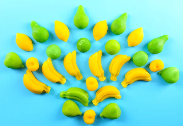 Fruit candies on blue — Stock Photo, Image