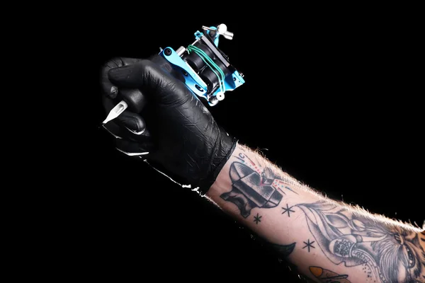 Tattooist hand in medical glove — Stock Photo, Image