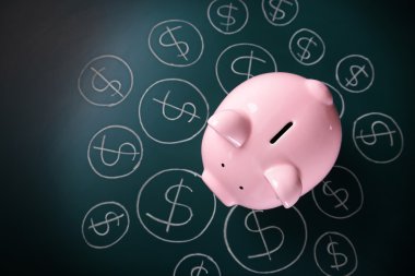 Doları para birimi simgeleri ile Piggy banka