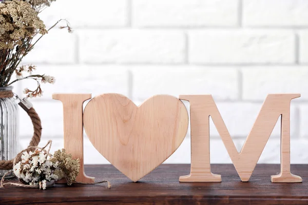 Wooden decor and flowers — Stock Photo, Image