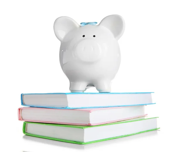 Piggy bank on books isolated — Stock Photo, Image