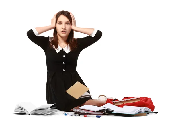 Belle écolière avec fournitures scolaires — Photo