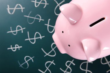 Doları para birimi simgeleri ile Piggy banka