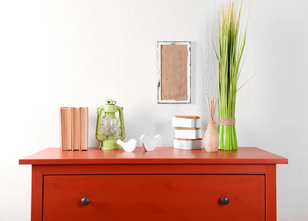 Room interior with red wooden commode — Stock Photo, Image